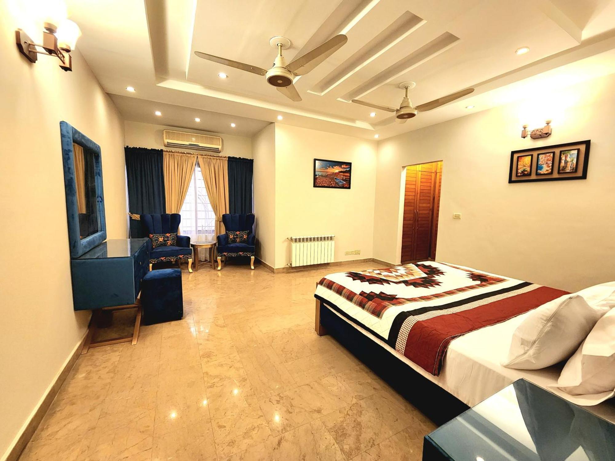 Luxurious Landing Apartments & Suites Bahria Town Ravalpindi Szoba fotó