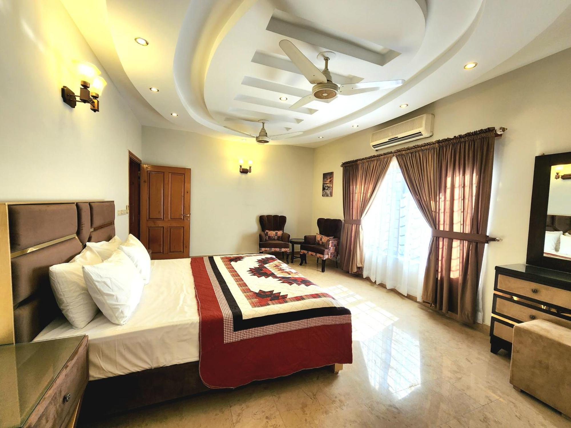 Luxurious Landing Apartments & Suites Bahria Town Ravalpindi Szoba fotó